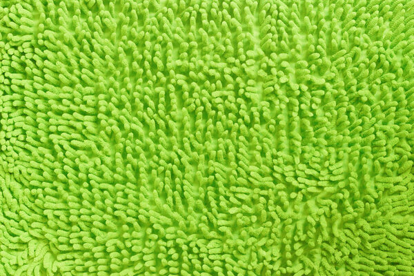 Background texture of green or yellow carpet 