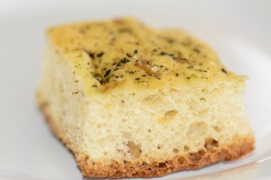 Beyaz blackground üzerinde ince otlar ile ekmek