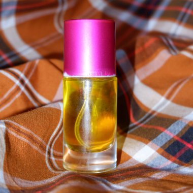perfume on a two-tone plaid background