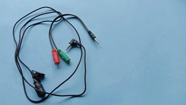 Photo of wired external microphone with cable that plugs into a smartphone or laptop