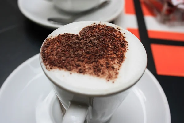 A cup of espressino decorated with heart — Stock Photo, Image