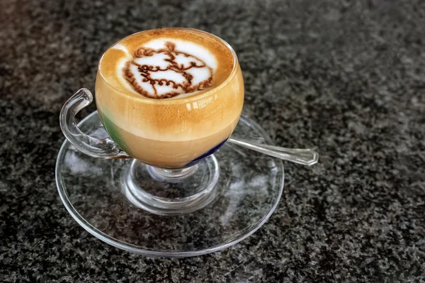 A cup of marocchino on the table — Stock Photo, Image