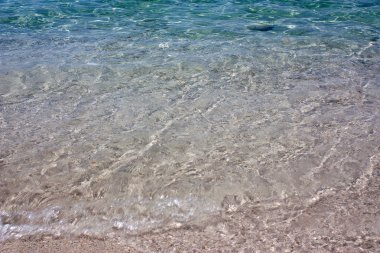 Plaj, olduğunu Arutas üzerinde hareketli bir kristal dalga.