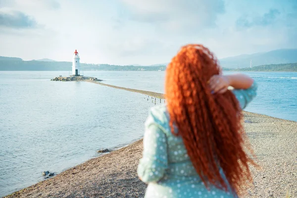 Young Beautiful Woman Long Red Hair Looks Distance Lighthouse While — Stock Photo, Image