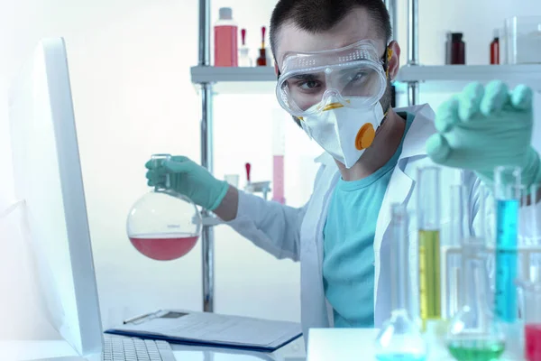 Chemistry Laboratory Assistant Protective Goggles Mask Examines Test Tubes Stock Picture