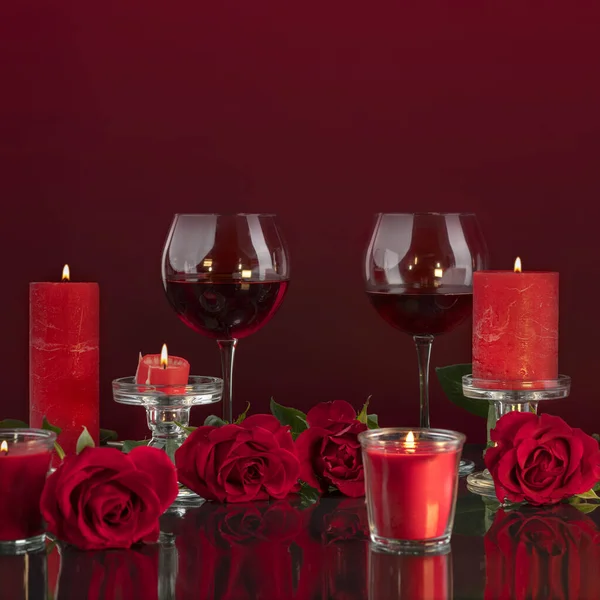 Lit Red Candles Transparent Candlesticks Illuminate Glasses Wine Surrounded Roses Stock Picture