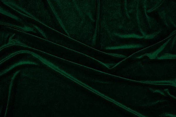 Kumaş örtüsü, altın arka plan, soyut arka plan. Şekilsiz boş yüzey. Lüks metalik zarafet kıvrımlı deseni desenlendirir..