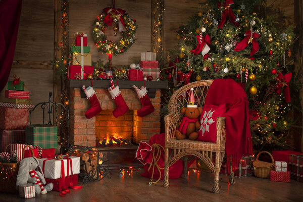 Fireplace and Christmas tree background. Festive interior inside wooden house, New Year's cheerful mood Spirit of Christmas. 