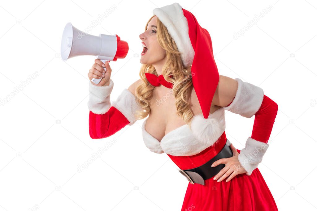 Lady Mrs. Santa Claus smiling happily with a laptop. Pretty woman in the red dress, white fur. Cheerful pin-up girlSanta'snta's hat. Female look at Christmas party