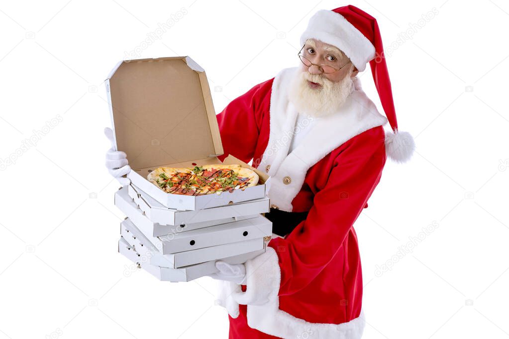 Santa Claus with pizza in boxes, delivery and order concept on white background isolated. Senior male actor old man with a real white beard in the role of Father Christmas