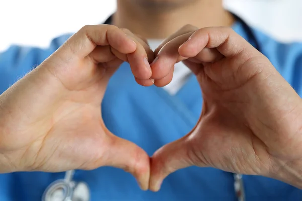 Hands of male medicine therapeutist doctor wearing blue uniform — Stock Photo, Image