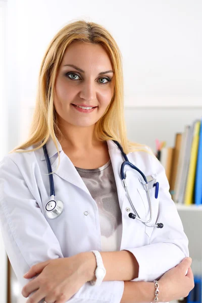 Female medicine doctor hands crossed on her chest — Stock Photo, Image