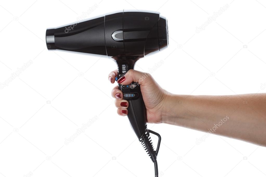 Female hand holding black hairdryer