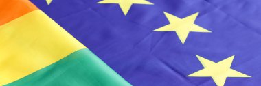 Lgbt ve eu bayrağı yan yana uzanan yakın plan arkaplanı