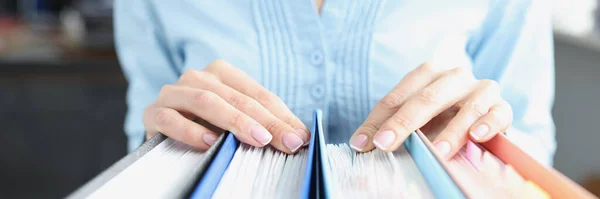 Womens hands on folders with documents closeup — Stock Photo, Image