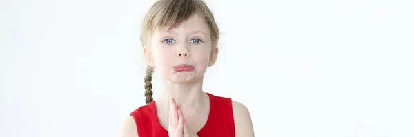 Portrait of an offended little girl with blond hair — Stock Photo, Image