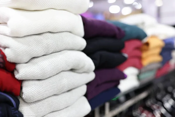 Folded Clothes Lying Store Shelf Closeup Black Friday Concept — Stock Photo, Image