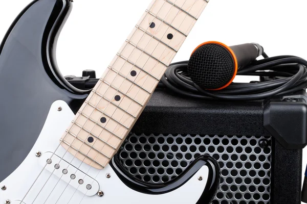 Guitar with amplifier, microphone and audio cord — Stock Photo, Image