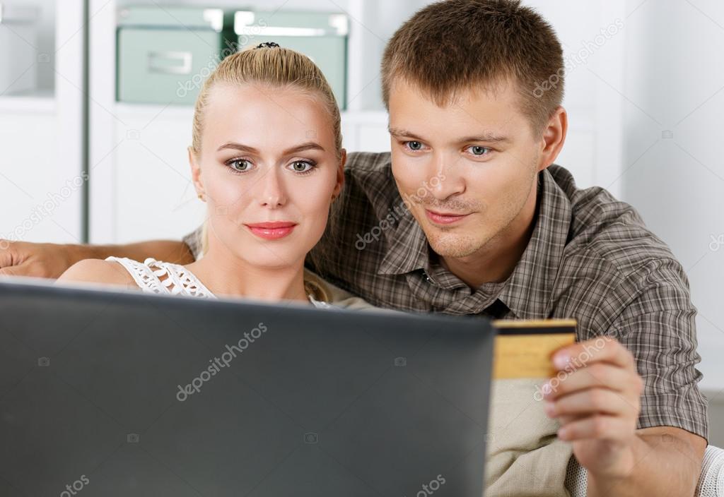 Family couple making shopping over internet