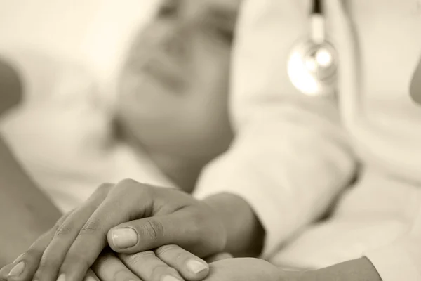 Friendly female doctor hands — Stock fotografie