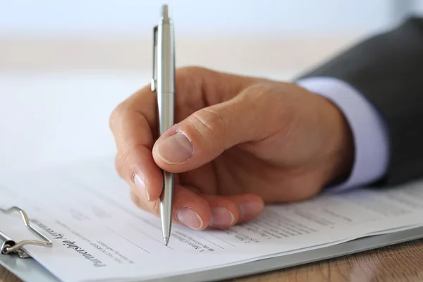 Hand of businessman in suit Stock Photo