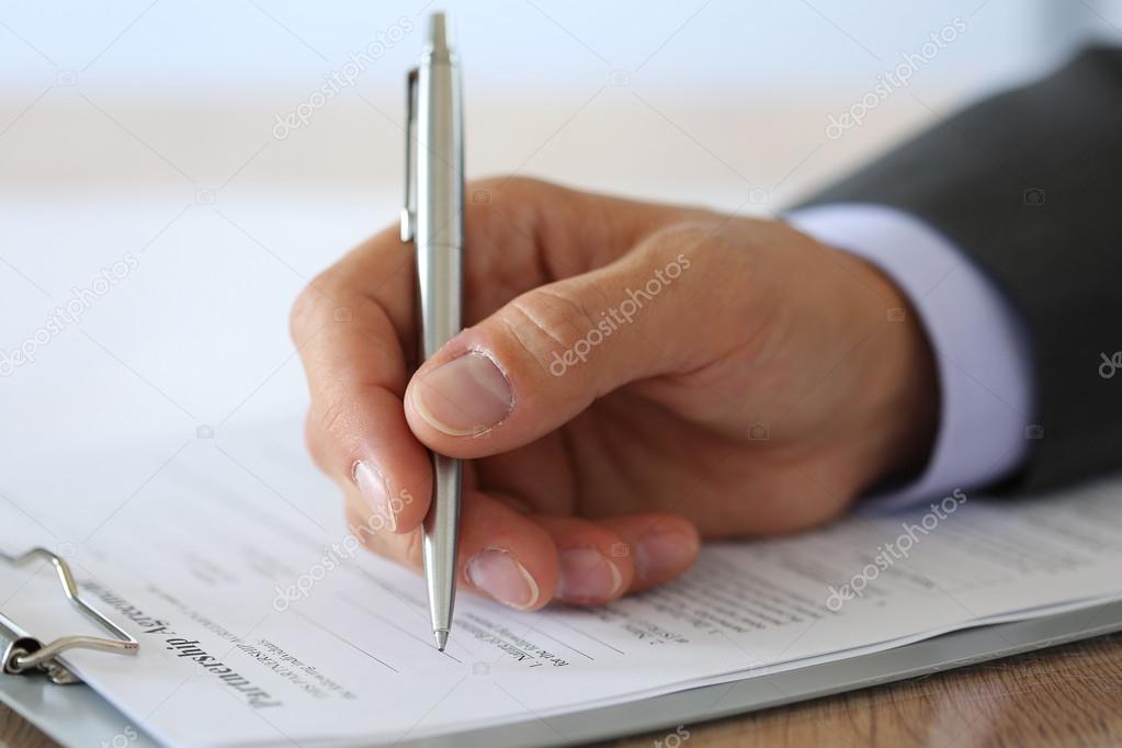 Hand of businessman in suit