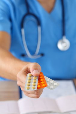 Giving or showing medications to patient