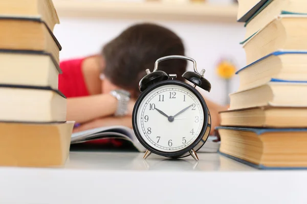 Tired female student at workplace — Stok fotoğraf