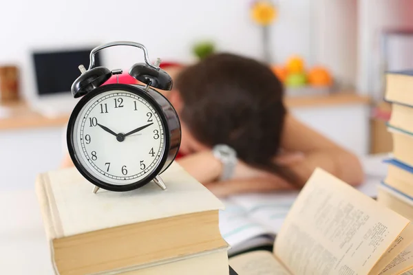 Tired female student at workplace — Stok fotoğraf