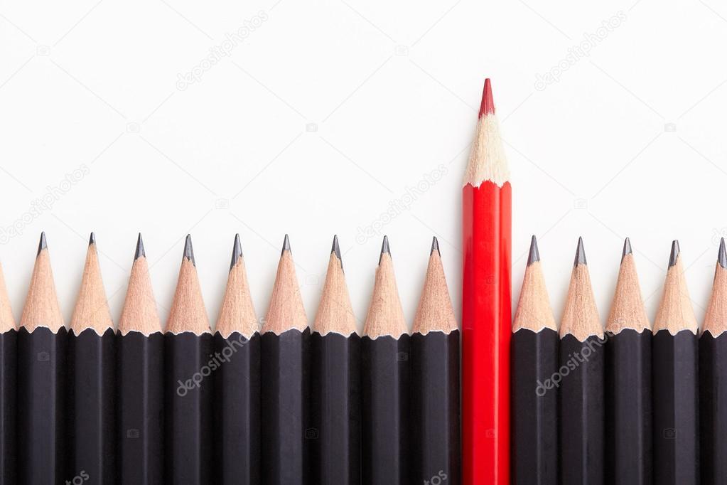 Red pencil standing out from crowd