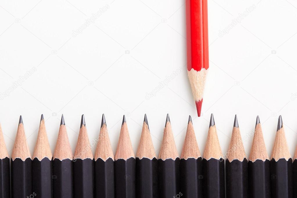 Red pencil standing out from crowd