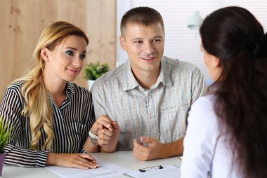 Young family couple trying to get loan clipart