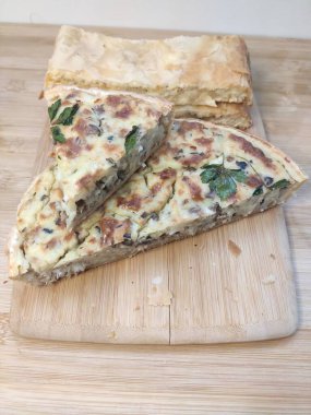 Pie with cottage cheese, potatoes, cheese or meat. Balkan cuisine.