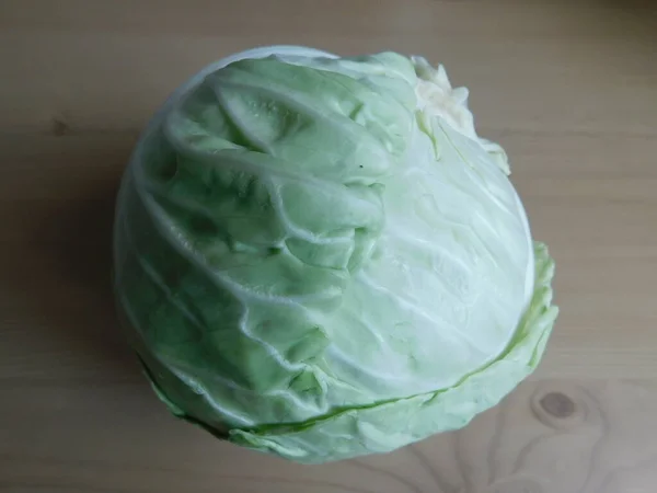 A head of fresh white cabbage on the table. — Stock Photo, Image