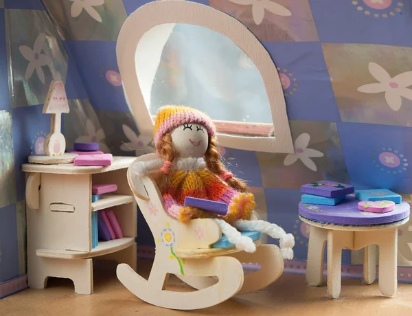 Doll in a chair — Stock Photo, Image