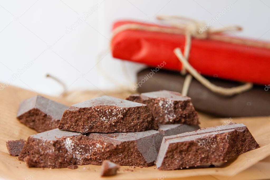 Modican chocolate: closeup of bites of traditional Sicilian chocolate