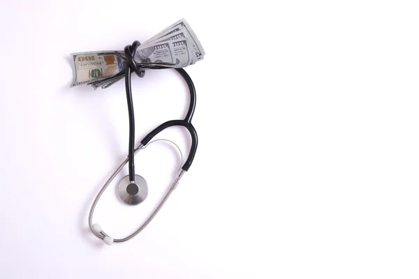 Isolated money and stethoscope — Stock Photo, Image