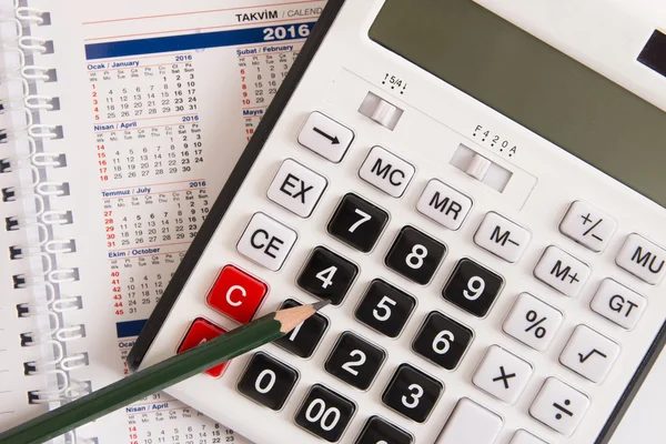 Calculator and calendar — Stock Photo, Image