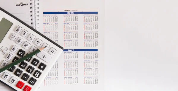 Calculator on the white — Stock Photo, Image