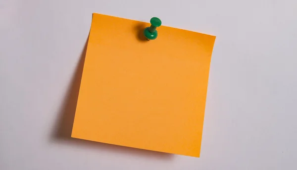 Orange note paper and nail — Stock Photo, Image