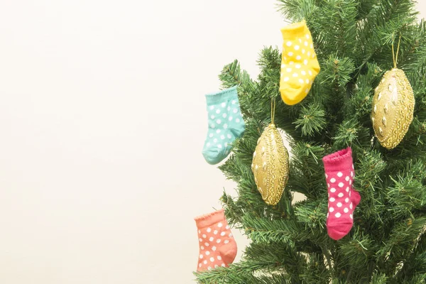 Christmas tree and stockings — Stock Photo, Image