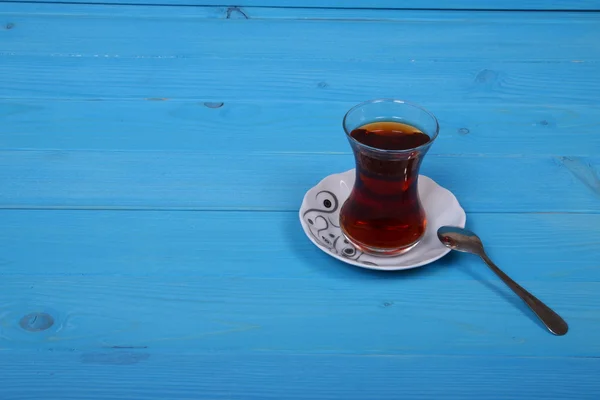 Tea on blue table — Stock Photo, Image