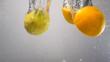 Limon ve portakal damla suya yavaş