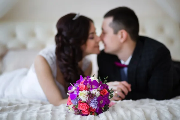 Wedding bridal bouquet on the background just married Stock Picture