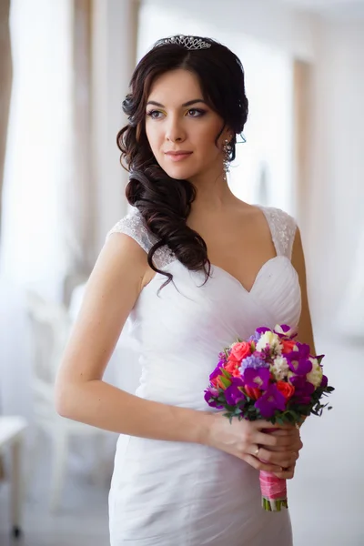 Portrait of the bride with a bouquet of flowers Royalty Free Stock Photos