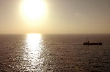 Fas 'ta okyanusun güzel yansımasıyla güzel bir gün batımı.