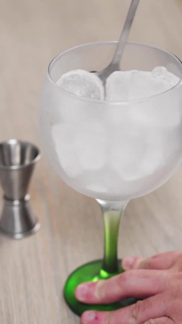 Slow Motion Cup Full Ice Being Cooled — Wideo stockowe