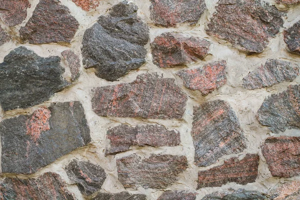 Yüzey granit taşlarla kaplı. Taş dokusu.