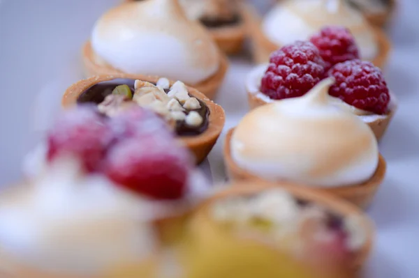 Assorted macaroons on plate — Stock Photo, Image