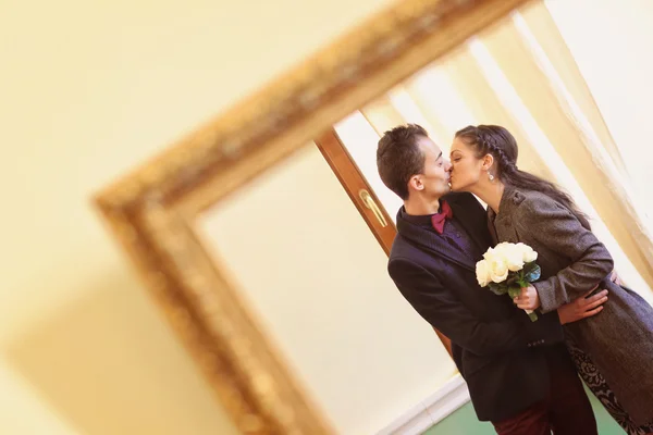 Couple kissing on their wedding day